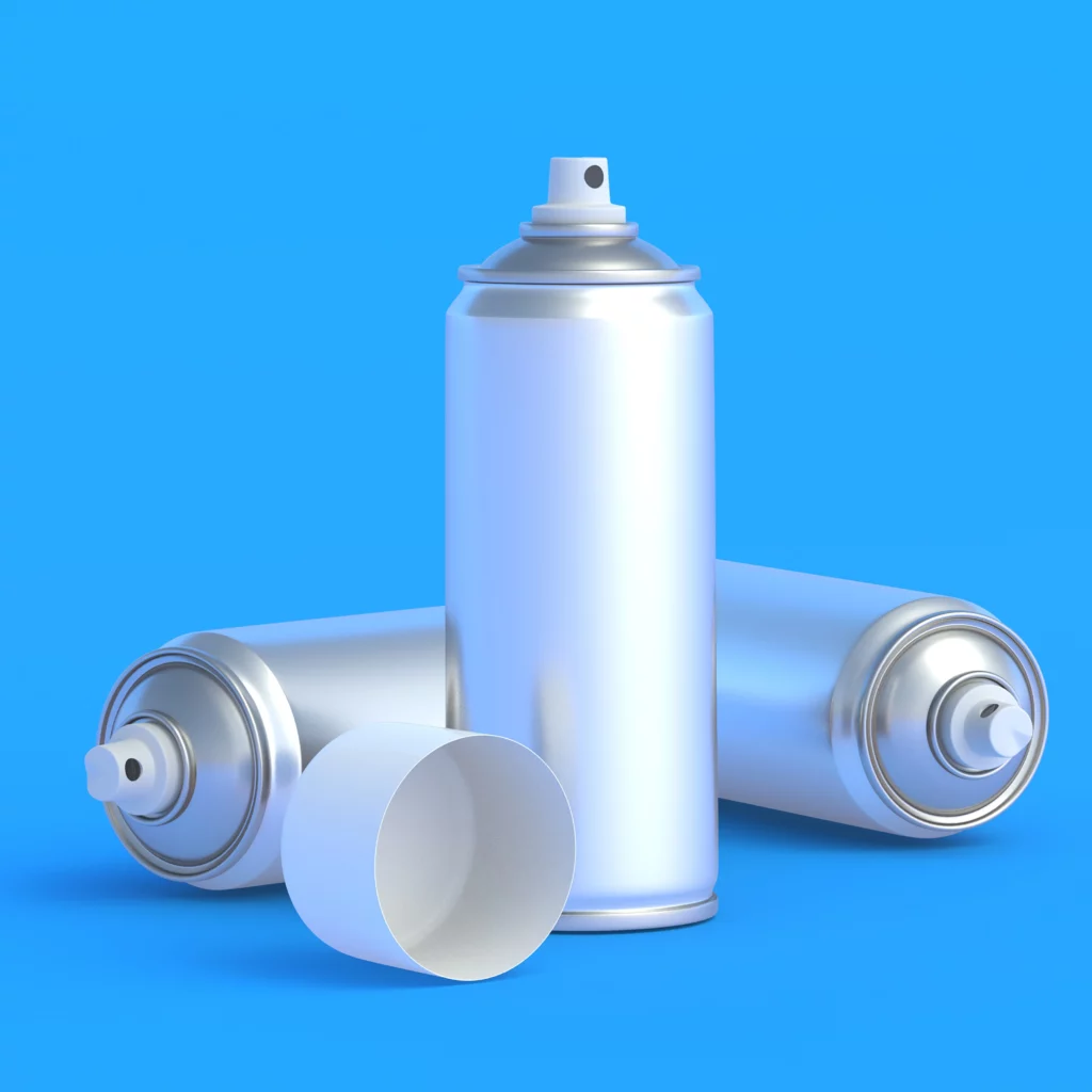 aerosol cans on blue background
